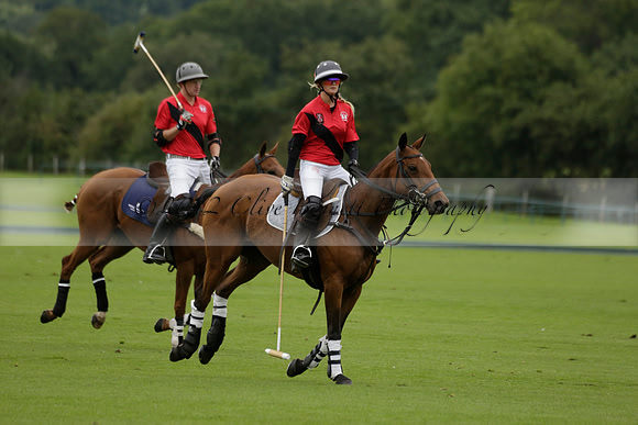 Four Quarters Black (black) v Clashleigh (red) in the Autumn Cup subsidiary final polo match on Ambersham 2 at Cowdray Park Polo Club on Sunday 22 September 2013 www.polopictures.co.uk
