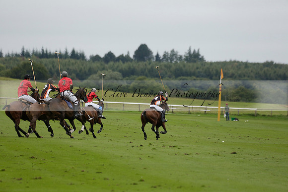 Four Quarters Black (black) v Clashleigh (red) in the Autumn Cup subsidiary final polo match on Ambersham 2 at Cowdray Park Polo Club on Sunday 22 September 2013 www.polopictures.co.uk