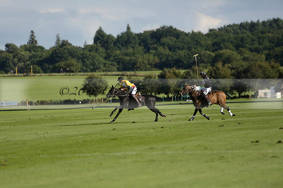 Aryana (black) v Shoreline (yellow) in a Farewell Cup polo match played on Ambersham 5 at Cowdray Park Polo Club on Wednesday 18 September 2013. www.polopictures.co.uk