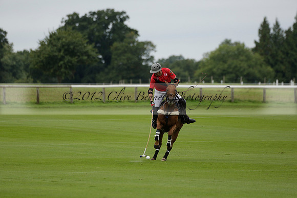 Four Quarters Black (black) v Clashleigh (red) in the Autumn Cup subsidiary final polo match on Ambersham 2 at Cowdray Park Polo Club on Sunday 22 September 2013 www.polopictures.co.uk