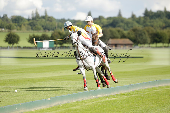 Aryana (black) v Shoreline (yellow) in a Farewell Cup polo match played on Ambersham 5 at Cowdray Park Polo Club on Wednesday 18 September 2013. www.polopictures.co.uk