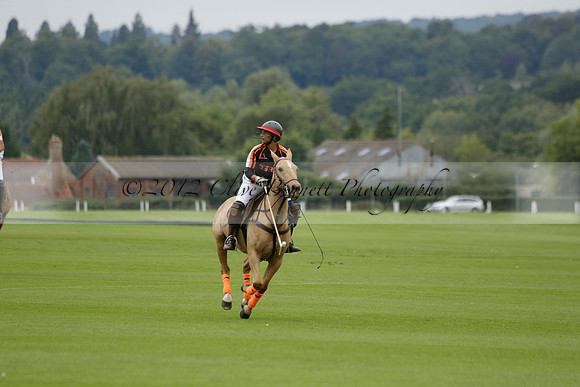 Four Quarters Black (black) v Clashleigh (red) in the Autumn Cup subsidiary final polo match on Ambersham 2 at Cowdray Park Polo Club on Sunday 22 September 2013 www.polopictures.co.uk