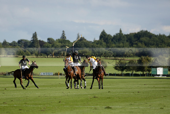 Aryana (black) v Shoreline (yellow) in a Farewell Cup polo match played on Ambersham 5 at Cowdray Park Polo Club on Wednesday 18 September 2013. www.polopictures.co.uk