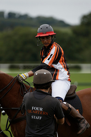 Four Quarters Black (black) v Clashleigh (red) in the Autumn Cup subsidiary final polo match on Ambersham 2 at Cowdray Park Polo Club on Sunday 22 September 2013 www.polopictures.co.uk