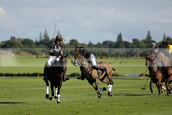 Aryana (black) v Shoreline (yellow) in a Farewell Cup polo match played on Ambersham 5 at Cowdray Park Polo Club on Wednesday 18 September 2013. www.polopictures.co.uk