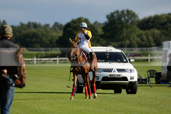 Aryana (black) v Shoreline (yellow) in a Farewell Cup polo match played on Ambersham 5 at Cowdray Park Polo Club on Wednesday 18 September 2013. www.polopictures.co.uk