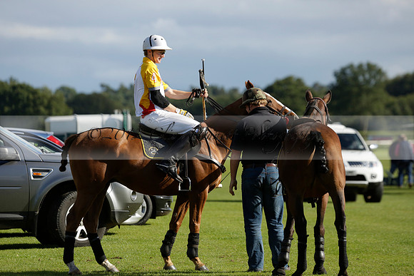 Aryana (black) v Shoreline (yellow) in a Farewell Cup polo match played on Ambersham 5 at Cowdray Park Polo Club on Wednesday 18 September 2013. www.polopictures.co.uk