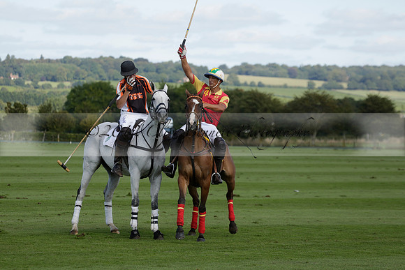 Four Quarters Black (black) v BHC (red) in a Autumn Cup polo match on Ambersham 2 at Cowdray Park Polo Club on Friday 20 September 2013 www.polopictures.co.uk