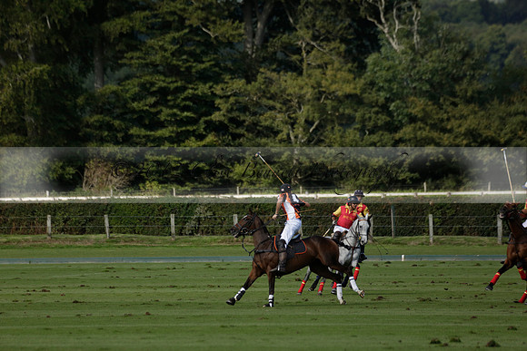 Four Quarters Black (black) v BHC (red) in a Autumn Cup polo match on Ambersham 2 at Cowdray Park Polo Club on Friday 20 September 2013 www.polopictures.co.uk