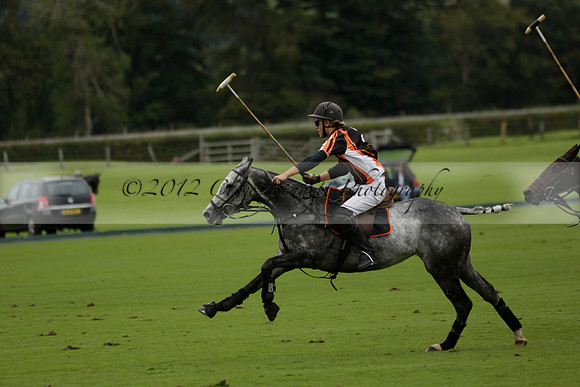 Four Quarters Black (black) v Clashleigh (red) in the Autumn Cup subsidiary final polo match on Ambersham 2 at Cowdray Park Polo Club on Sunday 22 September 2013 www.polopictures.co.uk