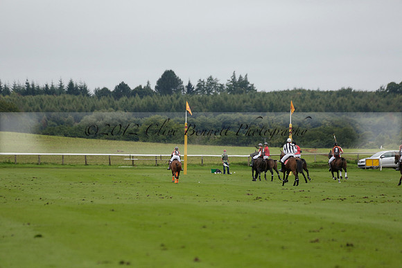Four Quarters Black (black) v Clashleigh (red) in the Autumn Cup subsidiary final polo match on Ambersham 2 at Cowdray Park Polo Club on Sunday 22 September 2013 www.polopictures.co.uk