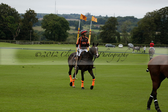 Four Quarters Black (black) v Clashleigh (red) in the Autumn Cup subsidiary final polo match on Ambersham 2 at Cowdray Park Polo Club on Sunday 22 September 2013 www.polopictures.co.uk