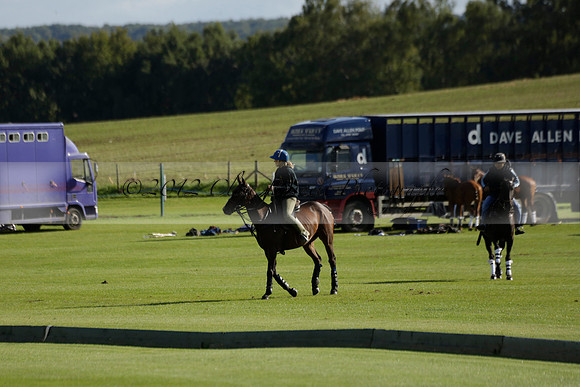 Aryana (black) v Shoreline (yellow) in a Farewell Cup polo match played on Ambersham 5 at Cowdray Park Polo Club on Wednesday 18 September 2013. www.polopictures.co.uk