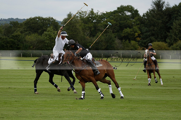 Aryana (black) v Home Farm (white) in a Farewell Cup polo match played on Ambersham 5 at Cowdray Park Polo Club on Wednesday 2013.09.11 www.polopictures.co.uk