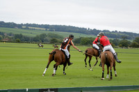 Four Quarters Black (black) v Clashleigh (red) in the Autumn Cup subsidiary final polo match on Ambersham 2 at Cowdray Park Polo Club on Sunday 22 September 2013 www.polopictures.co.uk