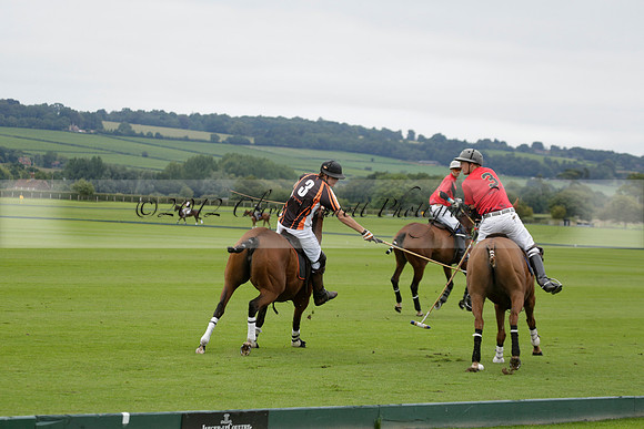 Four Quarters Black (black) v Clashleigh (red) in the Autumn Cup subsidiary final polo match on Ambersham 2 at Cowdray Park Polo Club on Sunday 22 September 2013 www.polopictures.co.uk