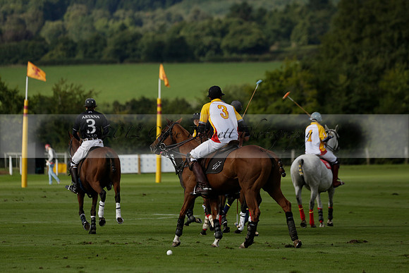 Aryana (black) v Shoreline (yellow) in a Farewell Cup polo match played on Ambersham 5 at Cowdray Park Polo Club on Wednesday 18 September 2013. www.polopictures.co.uk