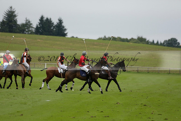 Four Quarters Black (black) v Clashleigh (red) in the Autumn Cup subsidiary final polo match on Ambersham 2 at Cowdray Park Polo Club on Sunday 22 September 2013 www.polopictures.co.uk