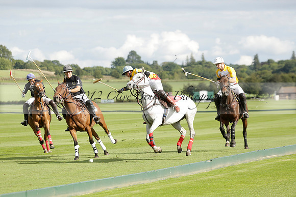 Aryana (black) v Shoreline (yellow) in a Farewell Cup polo match played on Ambersham 5 at Cowdray Park Polo Club on Wednesday 18 September 2013. www.polopictures.co.uk