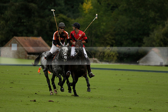Four Quarters Black (black) v Clashleigh (red) in the Autumn Cup subsidiary final polo match on Ambersham 2 at Cowdray Park Polo Club on Sunday 22 September 2013 www.polopictures.co.uk