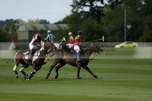 Four Quarters Black (black) v BHC (red) in a Autumn Cup polo match on Ambersham 2 at Cowdray Park Polo Club on Friday 20 September 2013 www.polopictures.co.uk