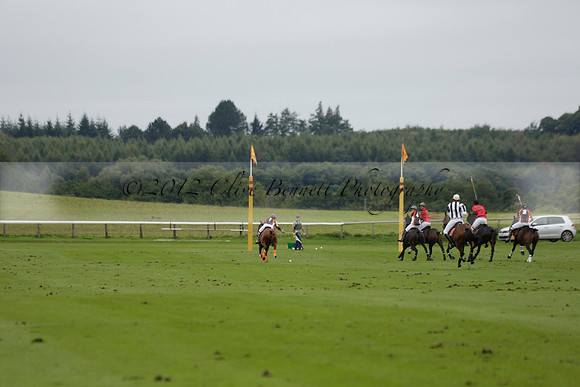Four Quarters Black (black) v Clashleigh (red) in the Autumn Cup subsidiary final polo match on Ambersham 2 at Cowdray Park Polo Club on Sunday 22 September 2013 www.polopictures.co.uk