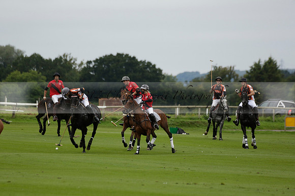 Four Quarters Black (black) v Clashleigh (red) in the Autumn Cup subsidiary final polo match on Ambersham 2 at Cowdray Park Polo Club on Sunday 22 September 2013 www.polopictures.co.uk