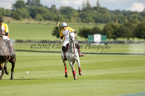 Aryana (black) v Shoreline (yellow) in a Farewell Cup polo match played on Ambersham 5 at Cowdray Park Polo Club on Wednesday 18 September 2013. www.polopictures.co.uk