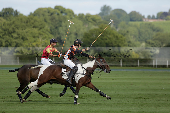 Four Quarters Black (black) v BHC (red) in a Autumn Cup polo match on Ambersham 2 at Cowdray Park Polo Club on Friday 20 September 2013 www.polopictures.co.uk