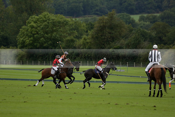 Four Quarters Black (black) v Clashleigh (red) in the Autumn Cup subsidiary final polo match on Ambersham 2 at Cowdray Park Polo Club on Sunday 22 September 2013 www.polopictures.co.uk