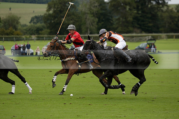Four Quarters Black (black) v Clashleigh (red) in the Autumn Cup subsidiary final polo match on Ambersham 2 at Cowdray Park Polo Club on Sunday 22 September 2013 www.polopictures.co.uk
