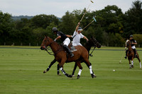 Aryana (black) v Home Farm (white) in a Farewell Cup polo match played on Ambersham 5 at Cowdray Park Polo Club on Wednesday 2013.09.11 www.polopictures.co.uk