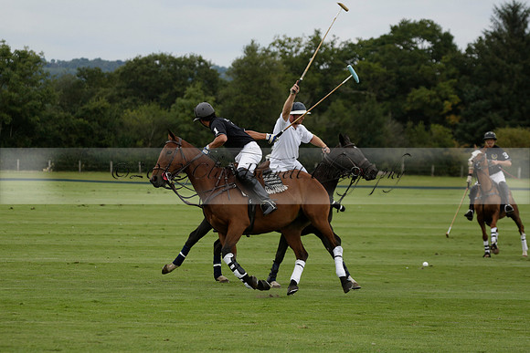 Aryana (black) v Home Farm (white) in a Farewell Cup polo match played on Ambersham 5 at Cowdray Park Polo Club on Wednesday 2013.09.11 www.polopictures.co.uk