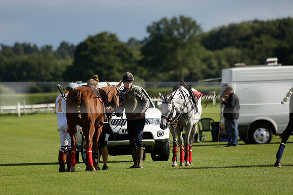 Aryana (black) v Shoreline (yellow) in a Farewell Cup polo match played on Ambersham 5 at Cowdray Park Polo Club on Wednesday 18 September 2013. www.polopictures.co.uk