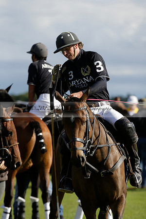 Aryana (black) v Shoreline (yellow) in a Farewell Cup polo match played on Ambersham 5 at Cowdray Park Polo Club on Wednesday 18 September 2013. www.polopictures.co.uk