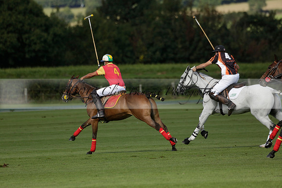 Four Quarters Black (black) v BHC (red) in a Autumn Cup polo match on Ambersham 2 at Cowdray Park Polo Club on Friday 20 September 2013 www.polopictures.co.uk