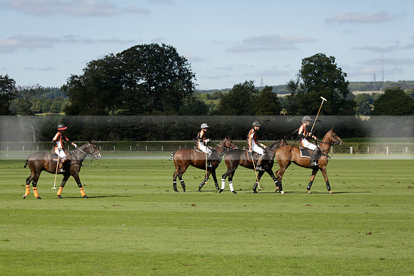 Four Quarters Black (black) v BHC (red) in a Autumn Cup polo match on Ambersham 2 at Cowdray Park Polo Club on Friday 20 September 2013 www.polopictures.co.uk