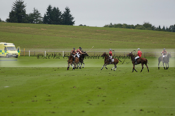 Four Quarters Black (black) v Clashleigh (red) in the Autumn Cup subsidiary final polo match on Ambersham 2 at Cowdray Park Polo Club on Sunday 22 September 2013 www.polopictures.co.uk