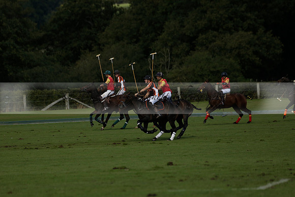 Four Quarters Black (black) v BHC (red) in a Autumn Cup polo match on Ambersham 2 at Cowdray Park Polo Club on Friday 20 September 2013 www.polopictures.co.uk