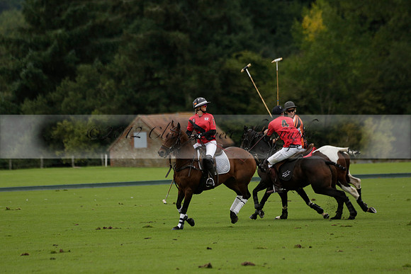 Four Quarters Black (black) v Clashleigh (red) in the Autumn Cup subsidiary final polo match on Ambersham 2 at Cowdray Park Polo Club on Sunday 22 September 2013 www.polopictures.co.uk
