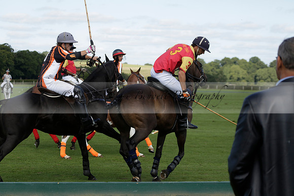 Four Quarters Black (black) v BHC (red) in a Autumn Cup polo match on Ambersham 2 at Cowdray Park Polo Club on Friday 20 September 2013 www.polopictures.co.uk