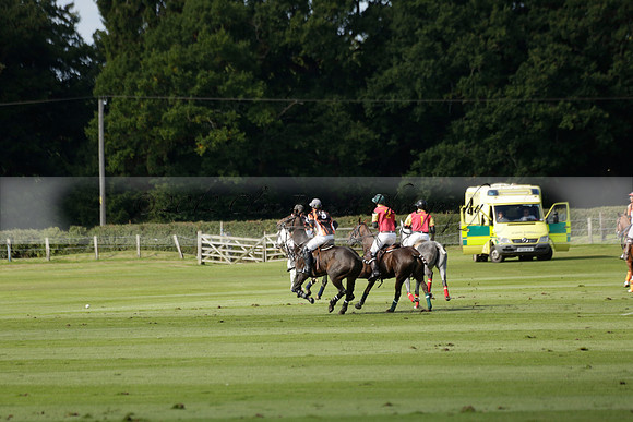 Four Quarters Black (black) v BHC (red) in a Autumn Cup polo match on Ambersham 2 at Cowdray Park Polo Club on Friday 20 September 2013 www.polopictures.co.uk