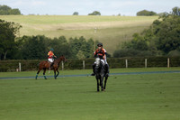 Four Quarters Black (black) v BHC (red) in a Autumn Cup polo match on Ambersham 2 at Cowdray Park Polo Club on Friday 20 September 2013 www.polopictures.co.uk