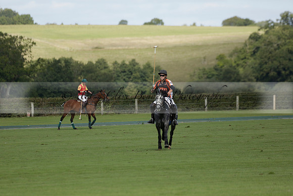 Four Quarters Black (black) v BHC (red) in a Autumn Cup polo match on Ambersham 2 at Cowdray Park Polo Club on Friday 20 September 2013 www.polopictures.co.uk