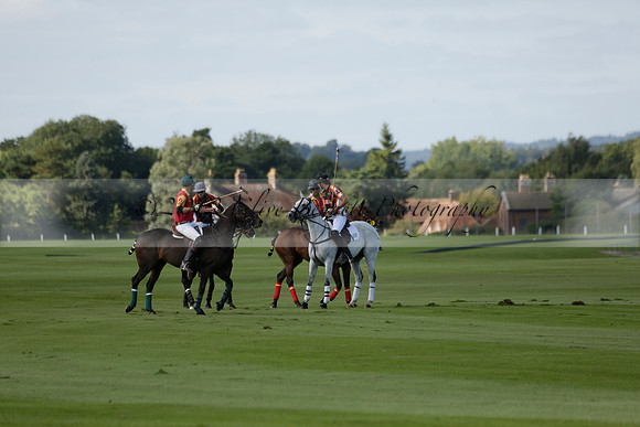 Four Quarters Black (black) v BHC (red) in a Autumn Cup polo match on Ambersham 2 at Cowdray Park Polo Club on Friday 20 September 2013 www.polopictures.co.uk