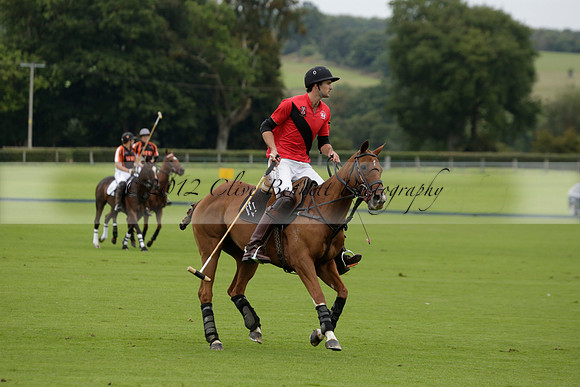 Four Quarters Black (black) v Clashleigh (red) in the Autumn Cup subsidiary final polo match on Ambersham 2 at Cowdray Park Polo Club on Sunday 22 September 2013 www.polopictures.co.uk