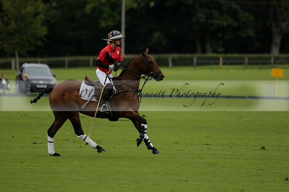 Four Quarters Black (black) v Clashleigh (red) in the Autumn Cup subsidiary final polo match on Ambersham 2 at Cowdray Park Polo Club on Sunday 22 September 2013 www.polopictures.co.uk