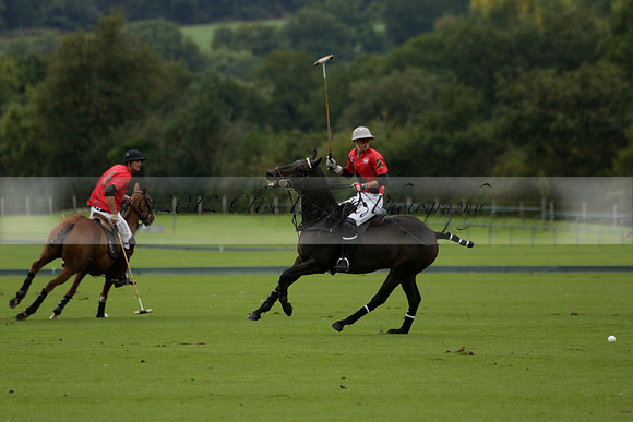 Four Quarters Black (black) v Clashleigh (red) in the Autumn Cup subsidiary final polo match on Ambersham 2 at Cowdray Park Polo Club on Sunday 22 September 2013 www.polopictures.co.uk