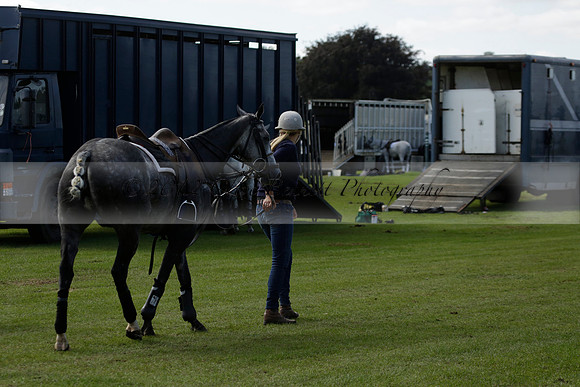Four Quarters Black (black) v BHC (red) in a Autumn Cup polo match on Ambersham 2 at Cowdray Park Polo Club on Friday 20 September 2013 www.polopictures.co.uk