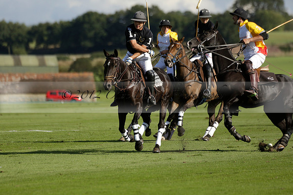 Aryana (black) v Shoreline (yellow) in a Farewell Cup polo match played on Ambersham 5 at Cowdray Park Polo Club on Wednesday 18 September 2013. www.polopictures.co.uk